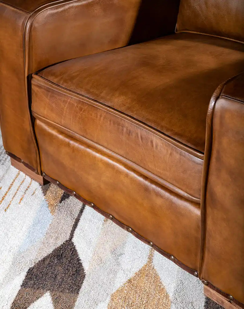 Close-up image of the plush, padded seat that highlights the premium upholstery and expert tailoring, ensuring lasting comfort and heirloom quality.