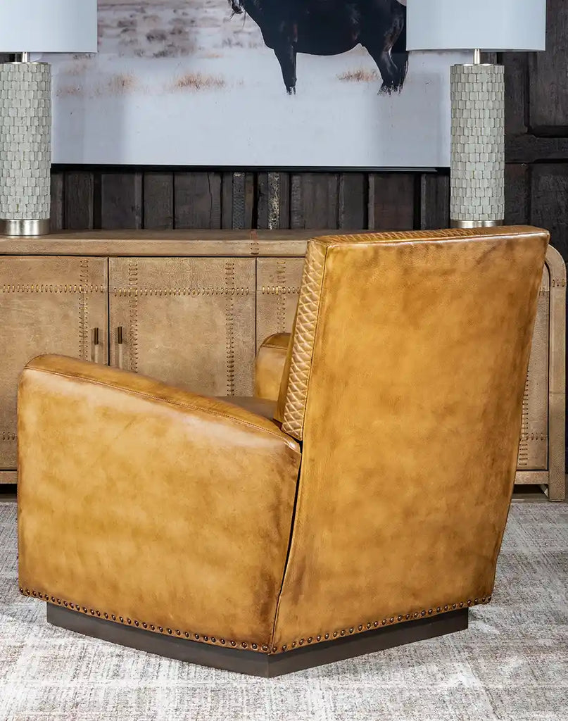 Back view of the Sand Dune Leather Recliner, displaying its seamless leather finish and classic design.