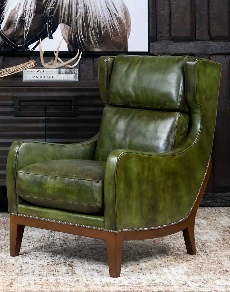 Seabrook Moss Leather Chair, showcasing its luxurious moss-green leather upholstery and refined silhouette.