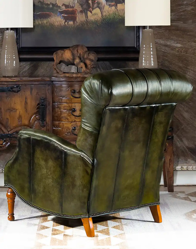 A rear view of the recliner, featuring the hand-burnished olive leather and sturdy American-made construction.