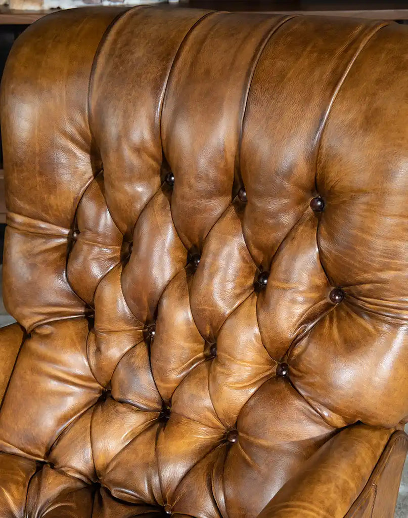 A detailed view of the deep button tufting on the Sleepers Haven Recliner’s backrest, adding a touch of elegance and sophistication.