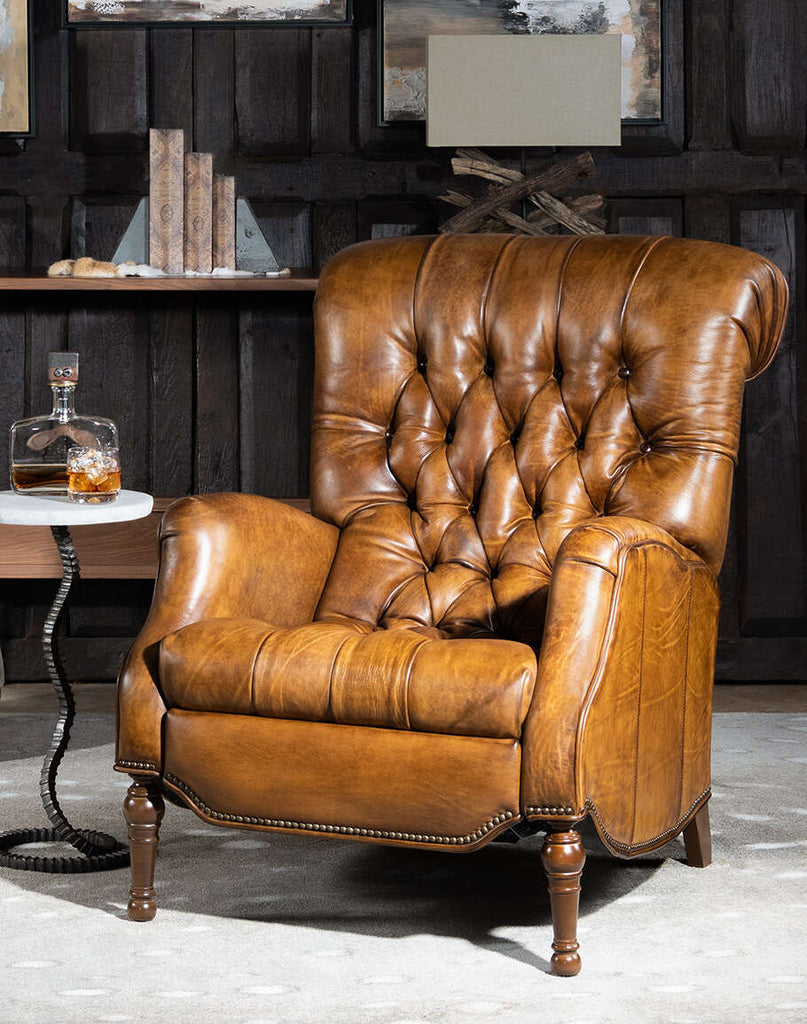 Sleepers Haven Saddle Recliner showcasing its rich saddle leather and deep button tufting.