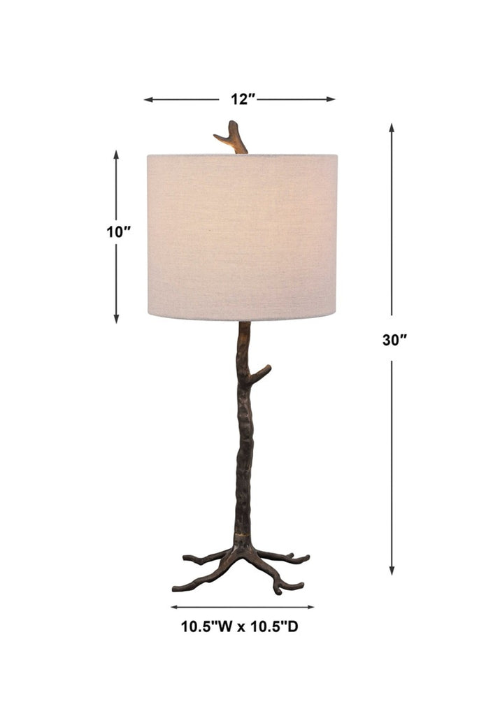 Modern table lamp with a nature-inspired base, available in gunmetal or antique gold, and a soft beige slubbed fabric shade.