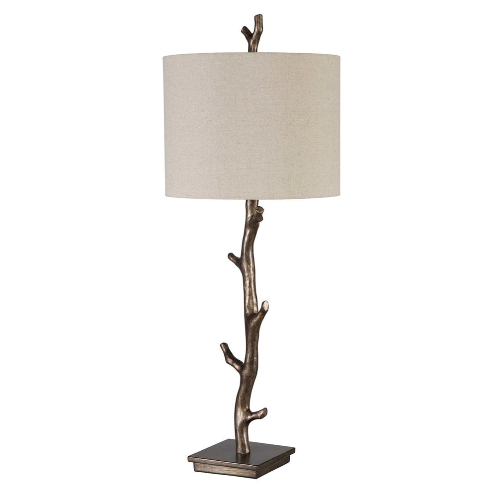 Modern table lamp with a refined branch-inspired base, dark bronze finish, and a light oatmeal slubbed linen shade.