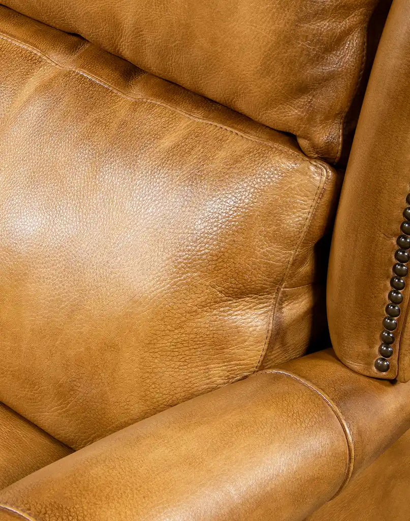 A close-up of the armrest on the St. Lauriat Recliner, highlighting the craftsmanship of the stitching