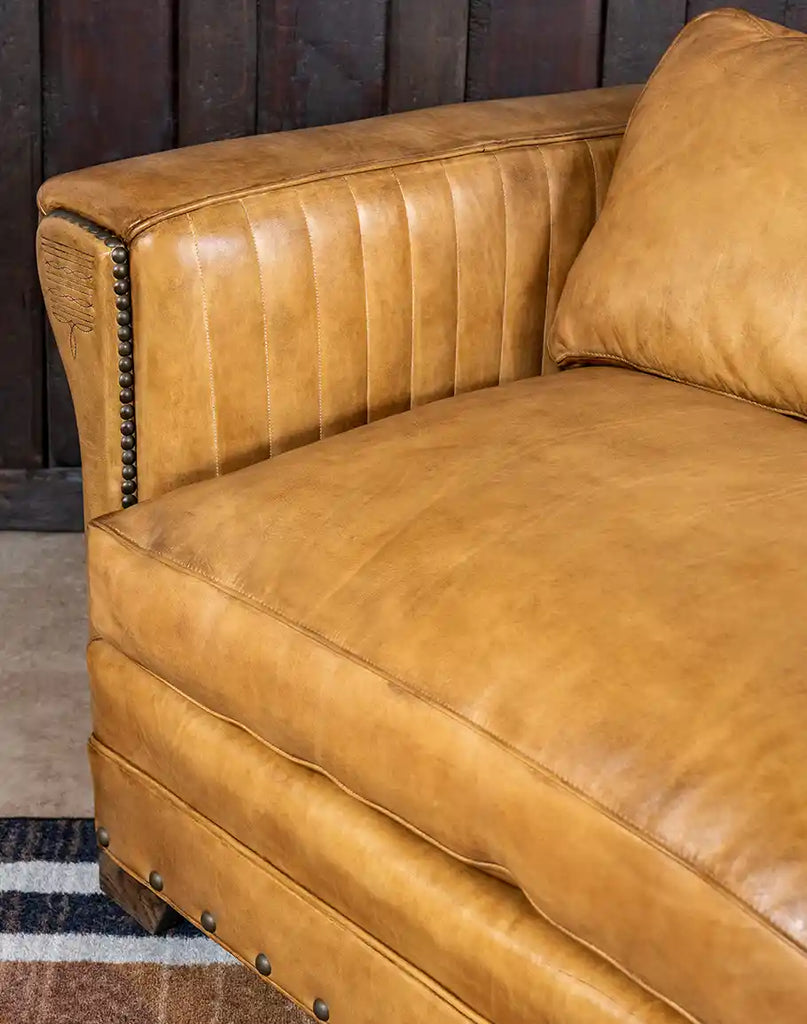 Detailed view of the generously cushioned seats of the Stallion Leather Sofa, offering exceptional comfort.