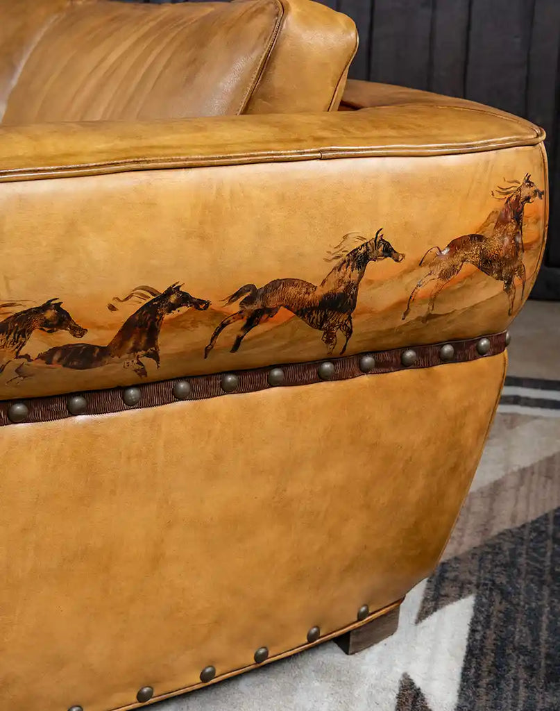 The hand-painted signature artwork by Wayne Parmenter on the Stallion Leather Sofa.