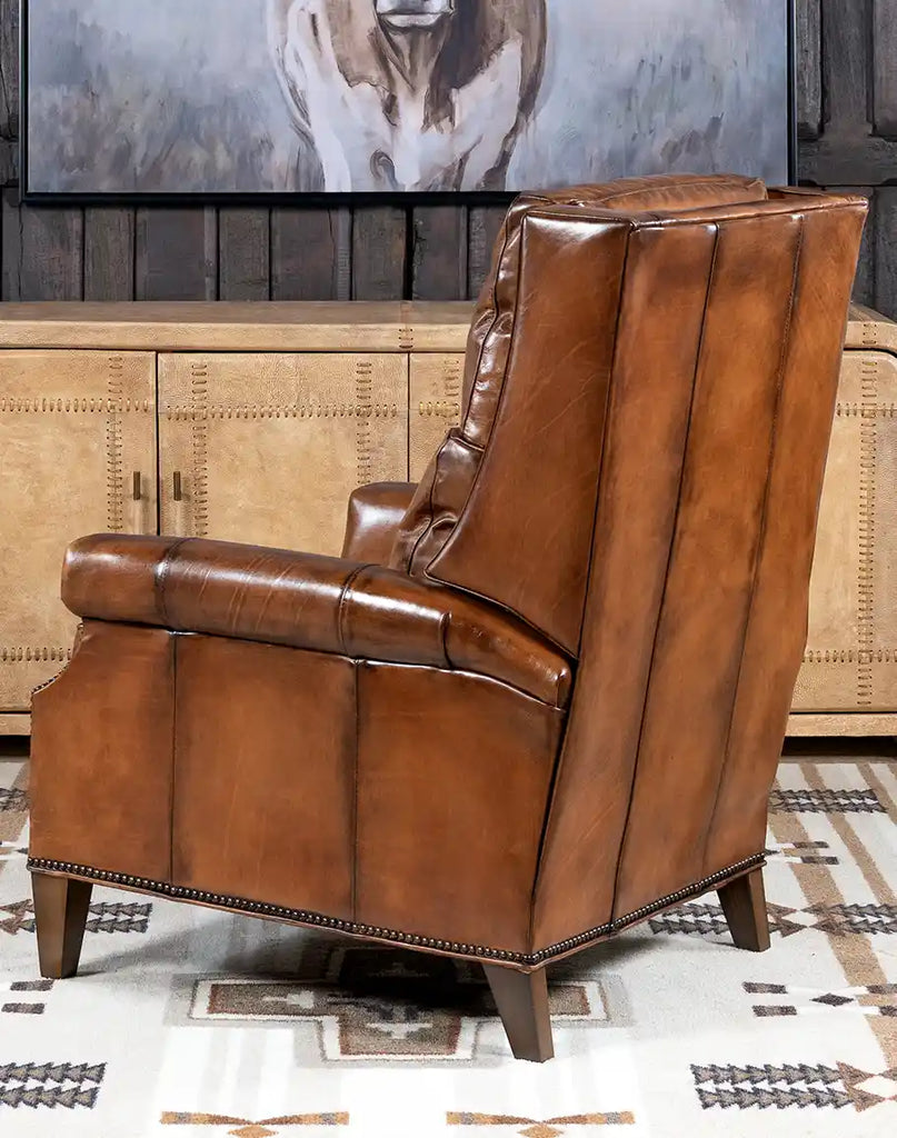 A back view of the Stanford Brown Leather Recliner showcasing its sleek, hand-burnished leather and refined design.