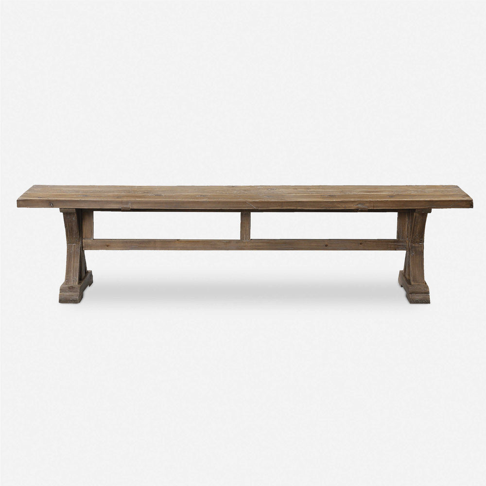 Rustic Stanford bench with a carved trestle base and vintage gray wash, ideal for farmhouse or vintage decor.