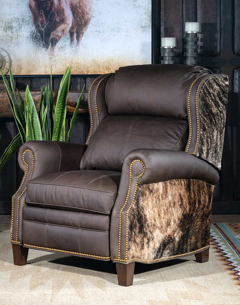 Stanley Brindleback Recliner showcasing its light brown top-grain leather, bustle-back design, and gold nail tack accents.