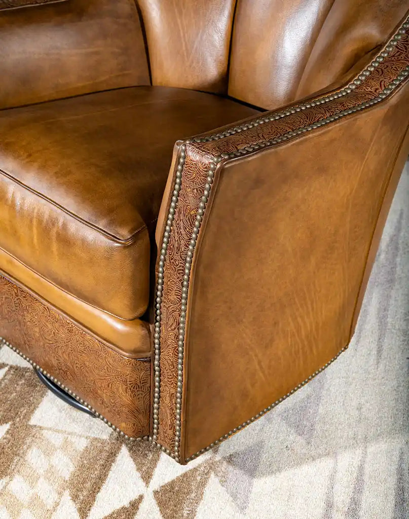 A close-up of the chair’s sturdy swivel and glider base, ensuring smooth movement and durability.