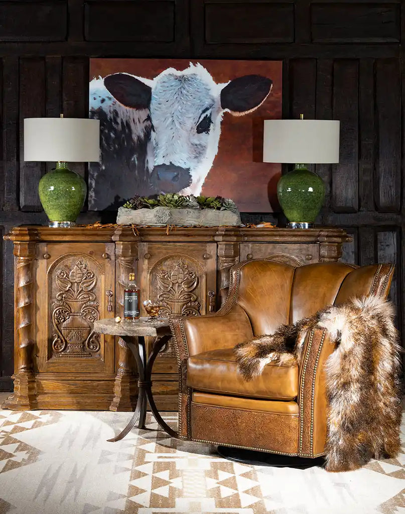 The chair styled in a rustic living space, demonstrating its timeless western charm and comfort.