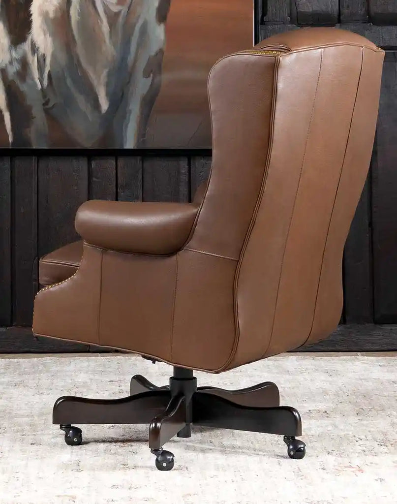 Back view of the Stockman Executive Desk Chair displaying its seamless leather finish and refined craftsmanship.