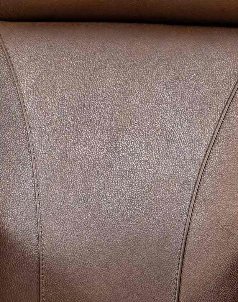 Close-up image capturing the rich texture and smooth finish of the top-grain leather upholstery on the Stockman Executive Desk Chair.