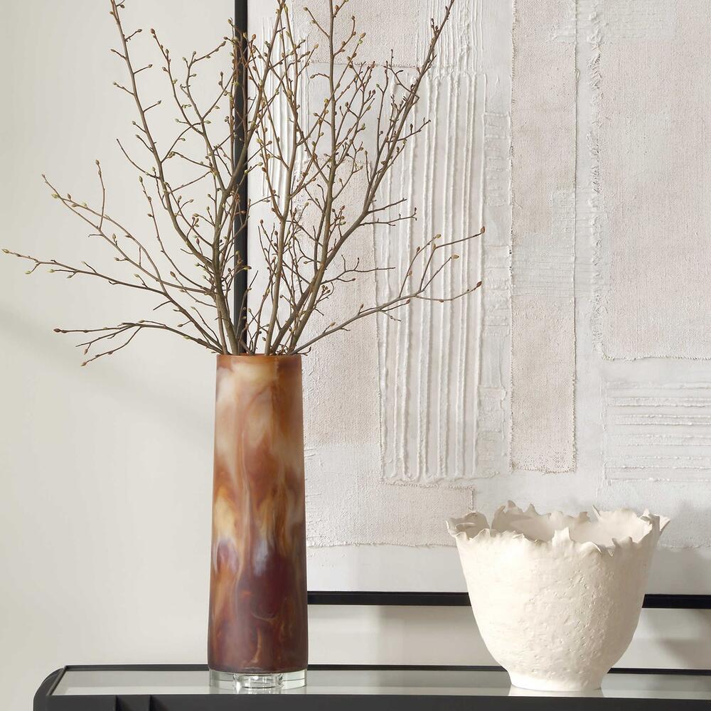 Tall glass vase with caramel and brown swirls, featuring a crystal base and elegant design, perfect for any home decor.