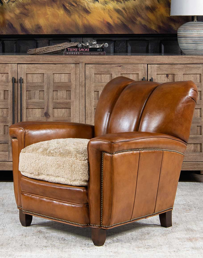 Tan Saddle Club Chair showcasing the chair's full-grain tan saddle leather upholstery and low-profile design.