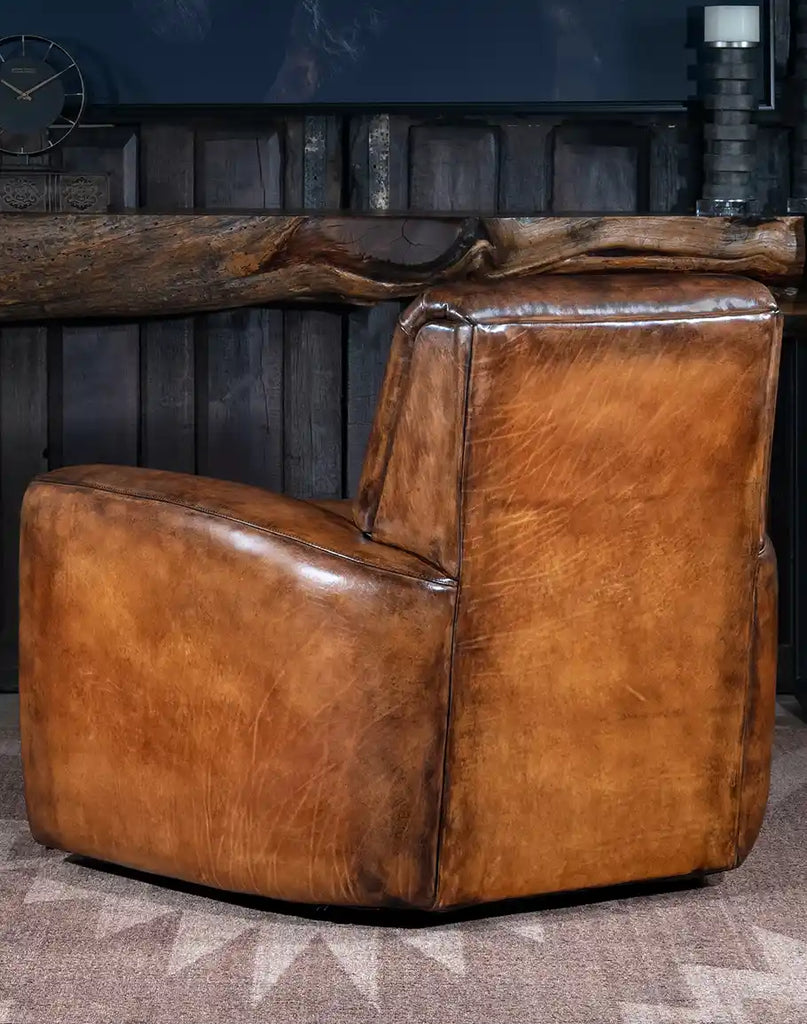 A rear view of the chair, displaying the smooth leather finish and fine craftsmanship.