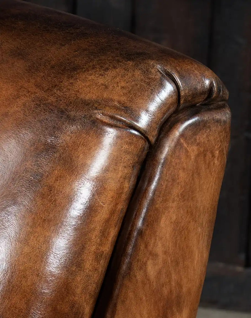 A macro shot of the high-quality full-grain leather, showcasing its rich texture and natural beauty.