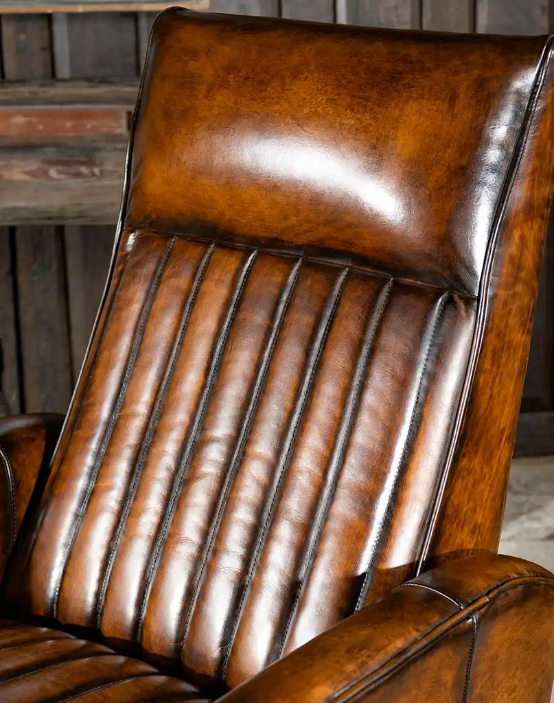 Tennessee Leather Recliner backrest, featuring hand-stitched channels and plush cushioning for superior comfort and support.