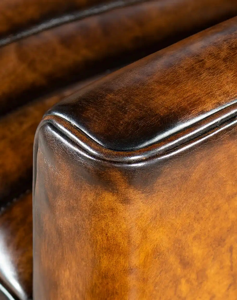 Close-up of the Tennessee Leather Recliner armrest, showing its sleek design and high-quality leather finish.