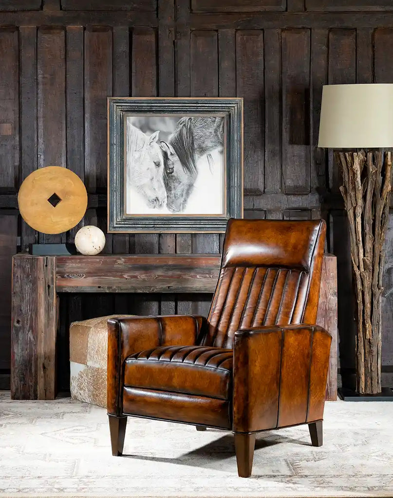 The Tennessee Leather Recliner displayed in a rustic décor setting, enhancing the space with its modern elegance.