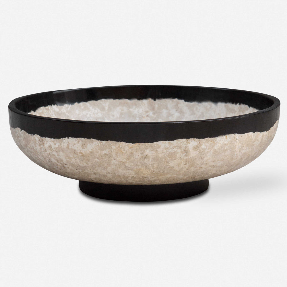 Black Rastica Bowl placed on a table, highlighting its elegant terrazzo and coral rim.