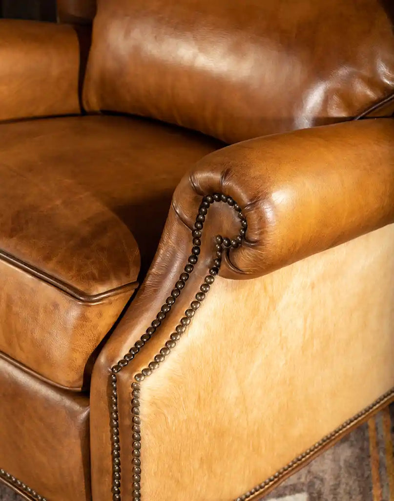 Padded armrests on the Texas Sadler Leather Recliner, designed for ultimate relaxation and ergonomic support.