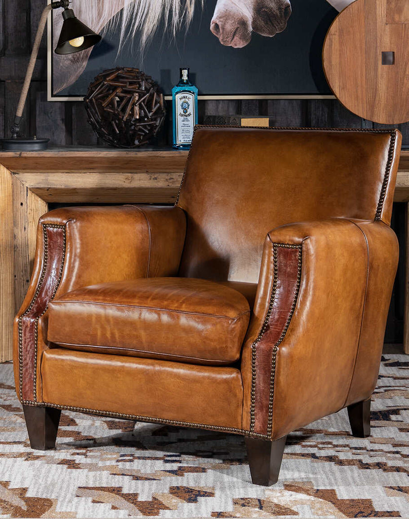 The Pioneer Club Chair showcasing its full-grain leather and classic rustic design.