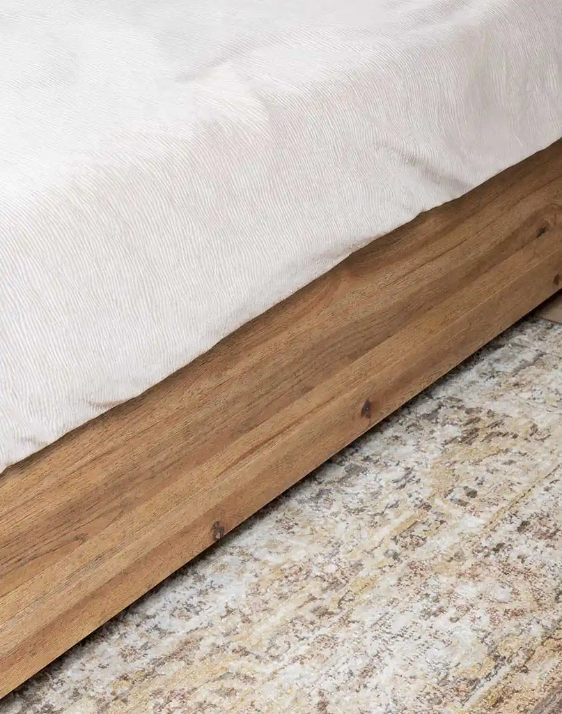 Detailed view of the side rail on the Tiara Sand Wooden Bed, showcasing its smooth finish and sturdy craftsmanship.