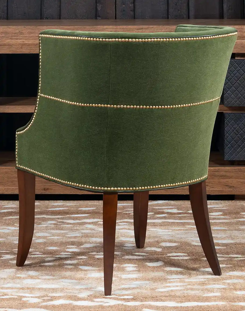 Back view of the TX Moss Green Chair featuring intricate gold nail tacks and full-grain leather welt.