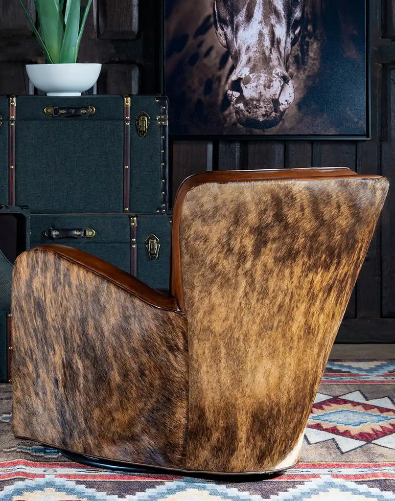 Back view of the Vaquero Swivel Chair featuring brindle cowhide craftsmanship.