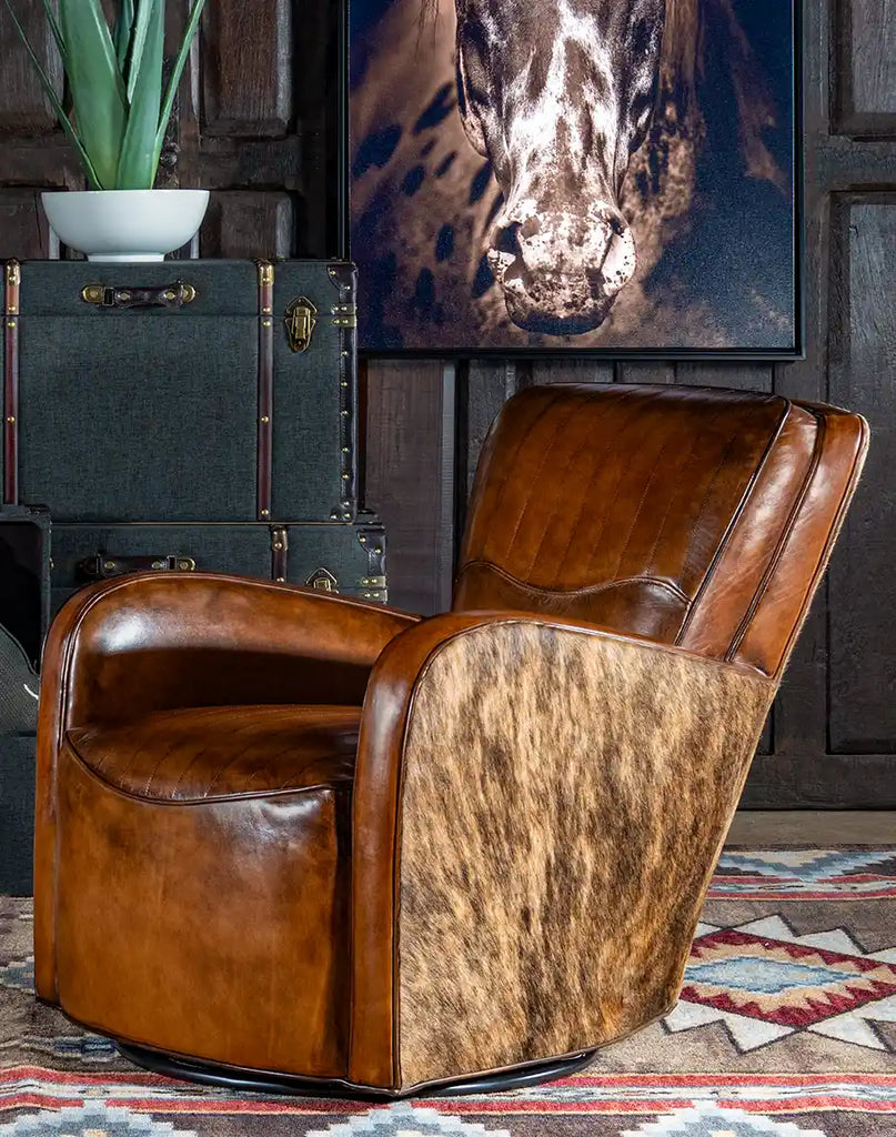 Side profile of the Vaquero Swivel Chair highlighting brindle cowhide on the arms and outer back.