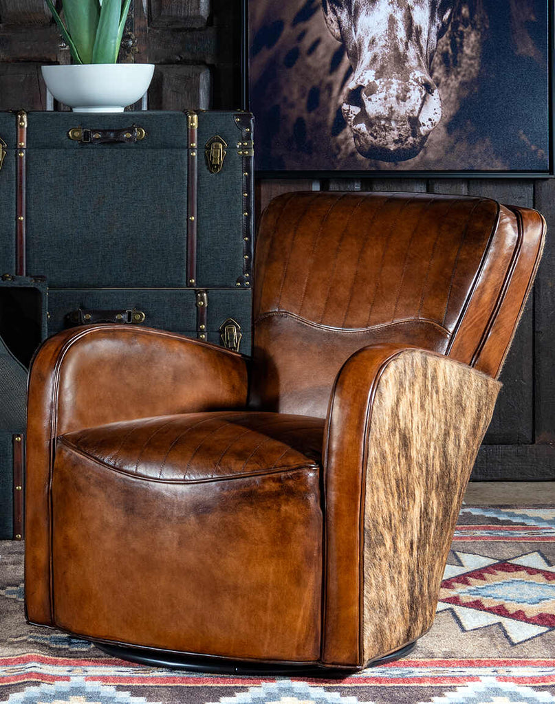 Vaquero Swivel Chair showcasing hand-burnished leather and brindle cowhide accents.