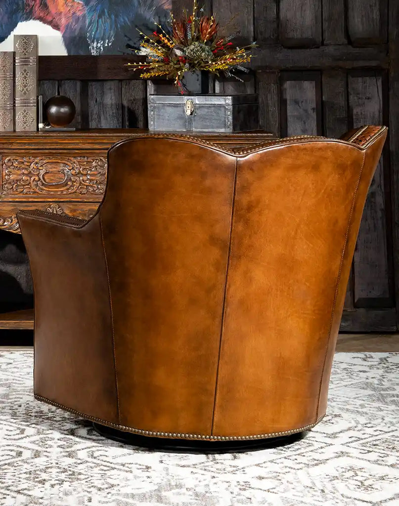 A rear view of the chair, displaying its rich leather finish and durable hardwood frame.