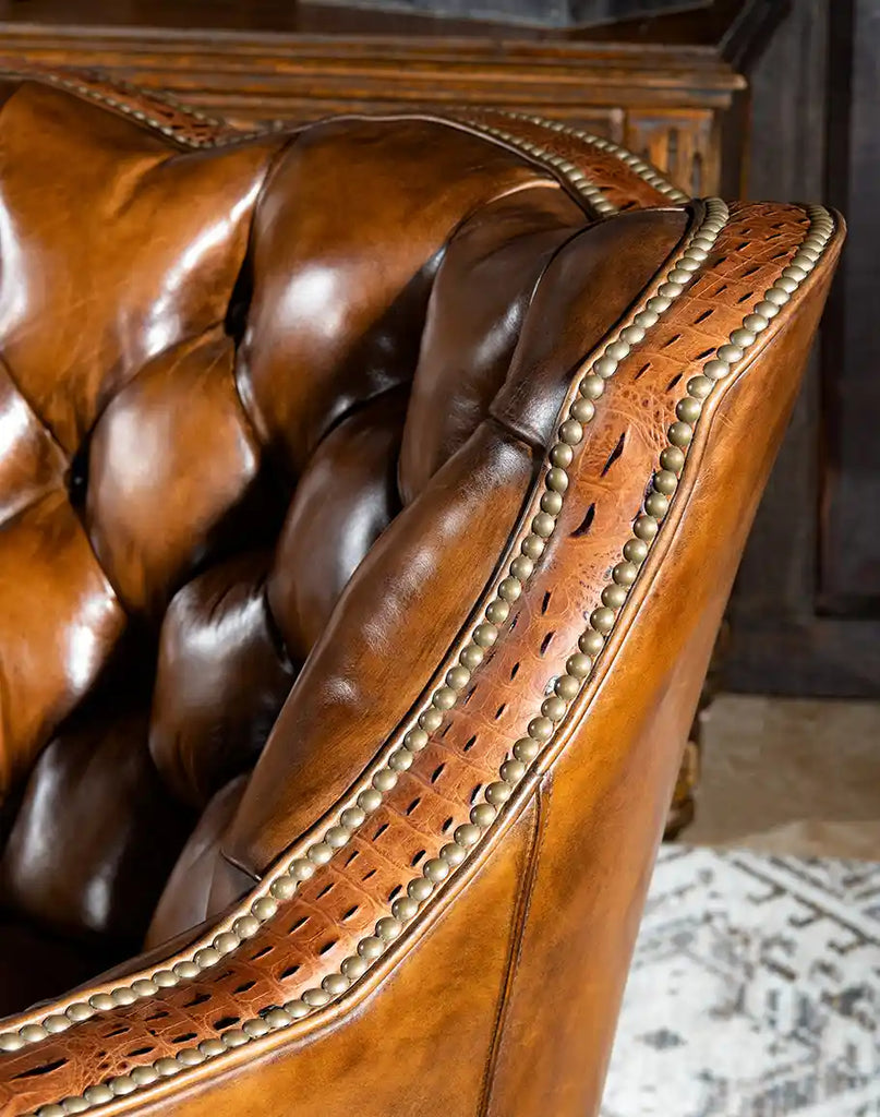 Close-up of the embossed croc leather on the armrests, adding a bold and sophisticated accent.