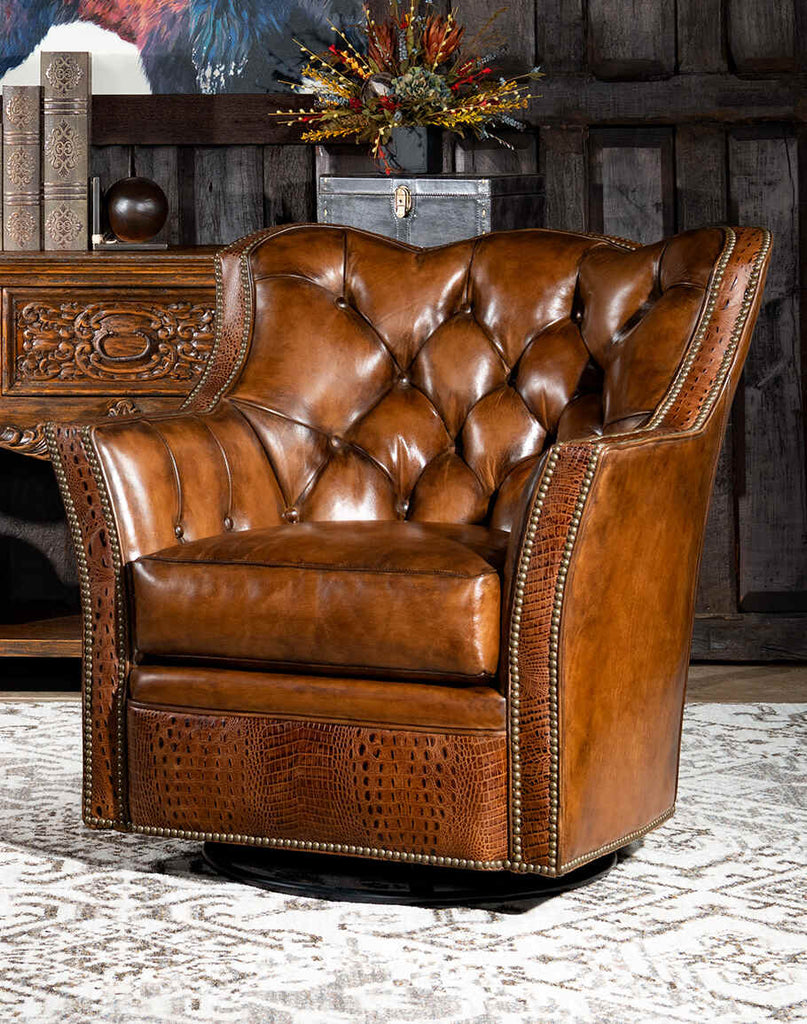 Vienna Swivel Glider showcasing its hand-burnished leather upholstery and deep tufted design.