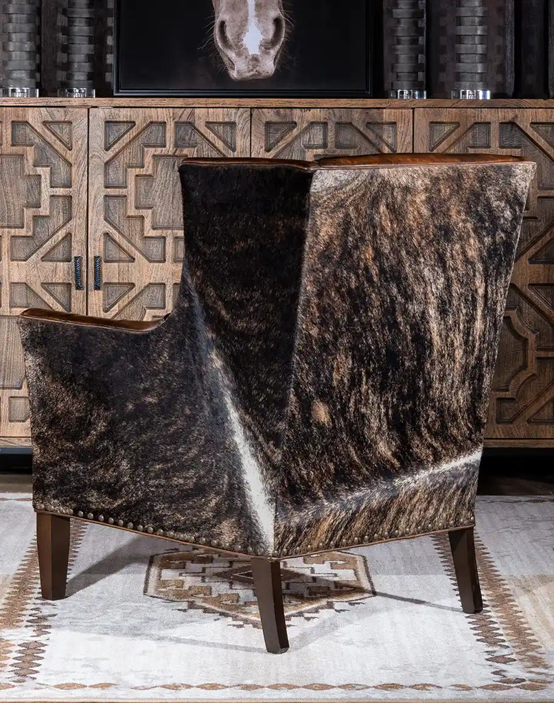 A back view of the Westlife Leather Chair featuring brindle cowhide wrapping and impeccable craftsmanship.