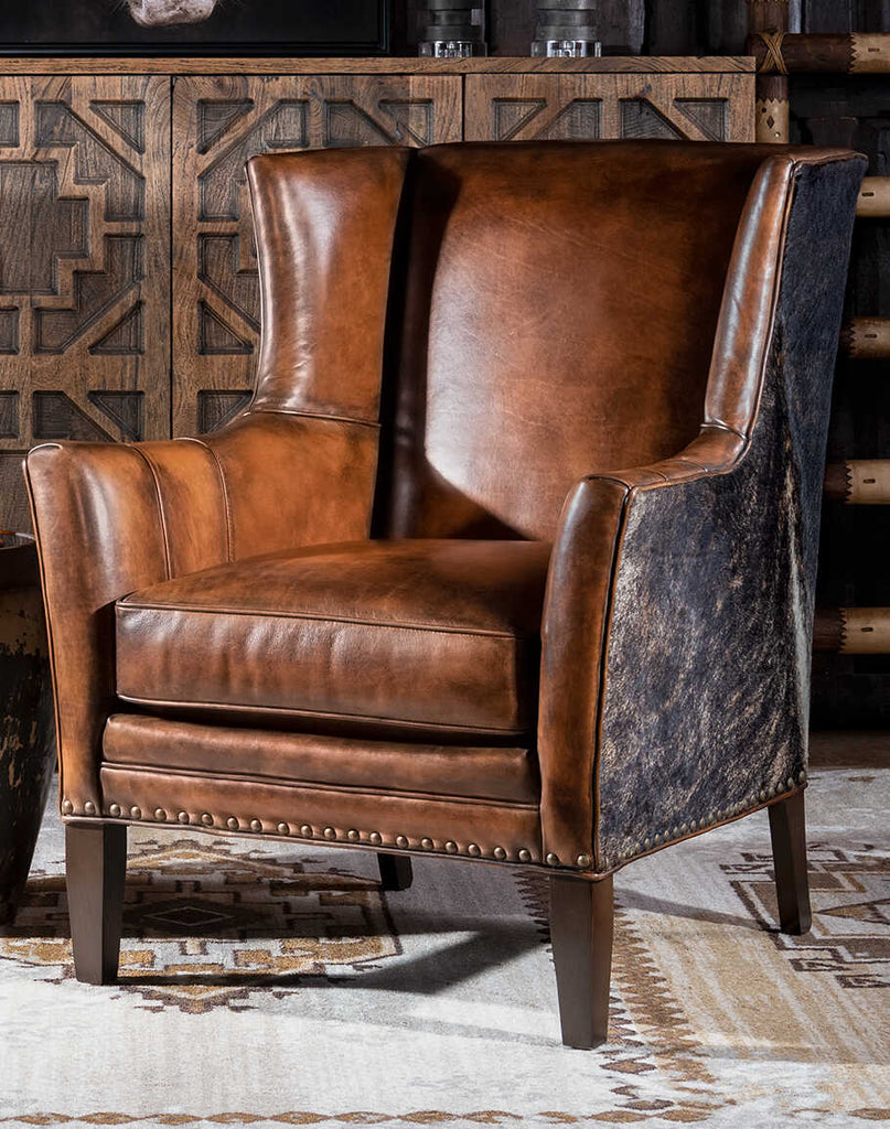 Westlife Leather Chair showcasing its luxurious full-grain leather upholstery and firm wingback design.