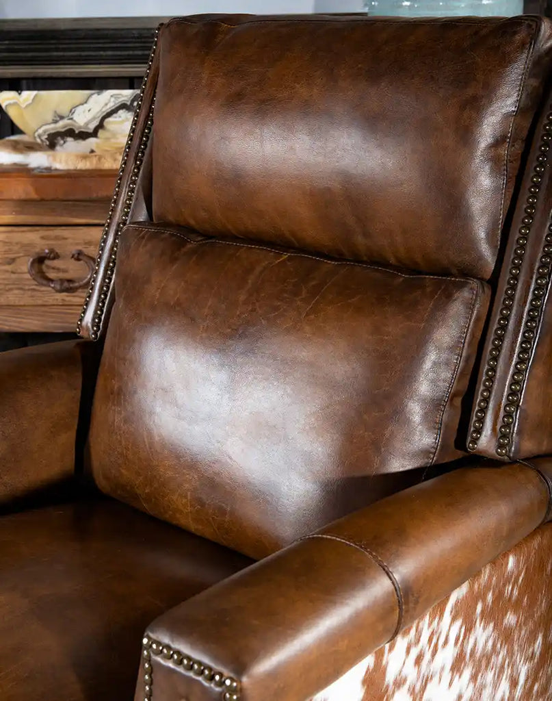 Detailed view of the bustle back on the Wrangler Leather Recliner, providing exceptional neck and lower back support.