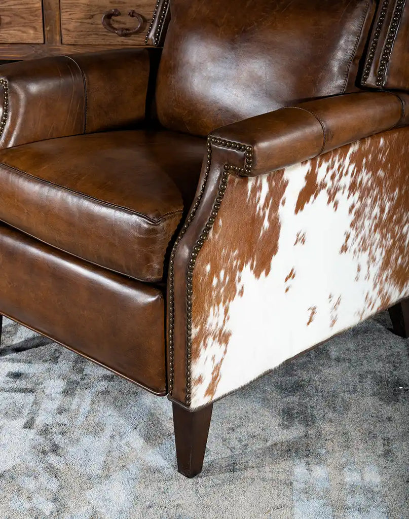 Close-up of the cowhide upholstery on the Wrangler Leather Recliner, adding a unique Western charm to its design.