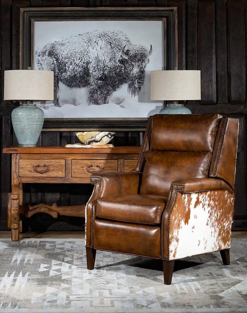 Side view of the Wrangler Leather Recliner highlighting its supportive bustle back and elegant cowhide accents.